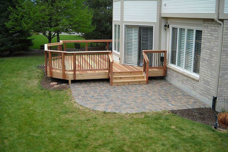 Wooden deck and stone patio area