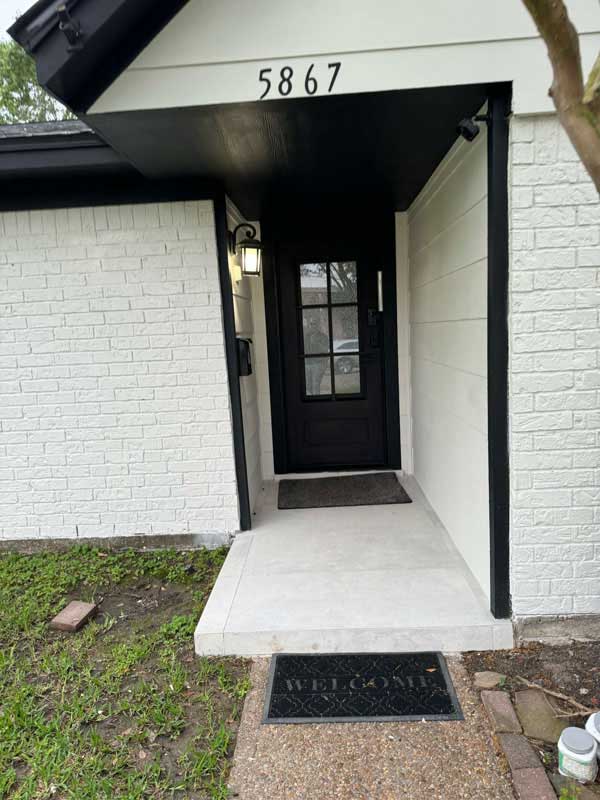 Exterior painting and siding replacement improving curb appeal in Southeast Houston