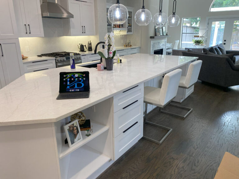 Three-layer kitchen lighting design showing task, ambient, and accent lighting placement