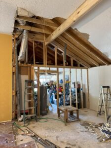 Thermal imaging camera detecting air leaks around home windows