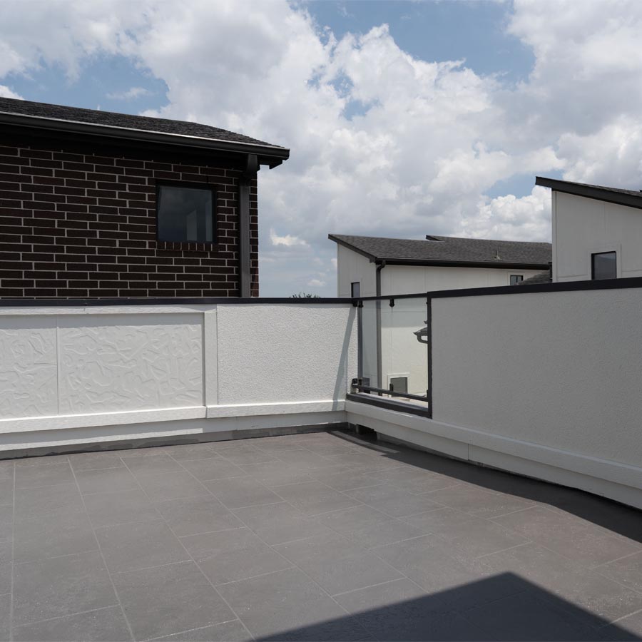 Newly waterproofed balcony with modern tile flooring in 77007 townhome