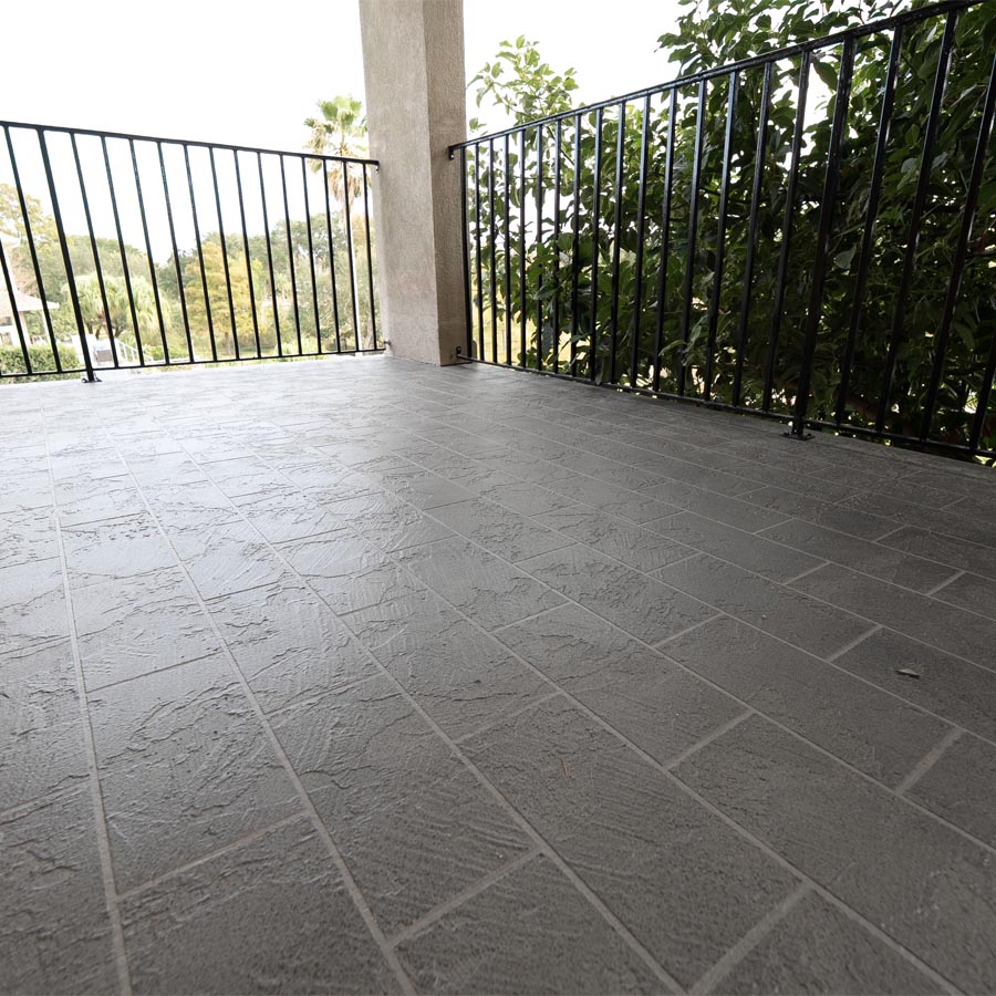 Waterproofed balcony with proper drainage slope and decorative finish stafford tx