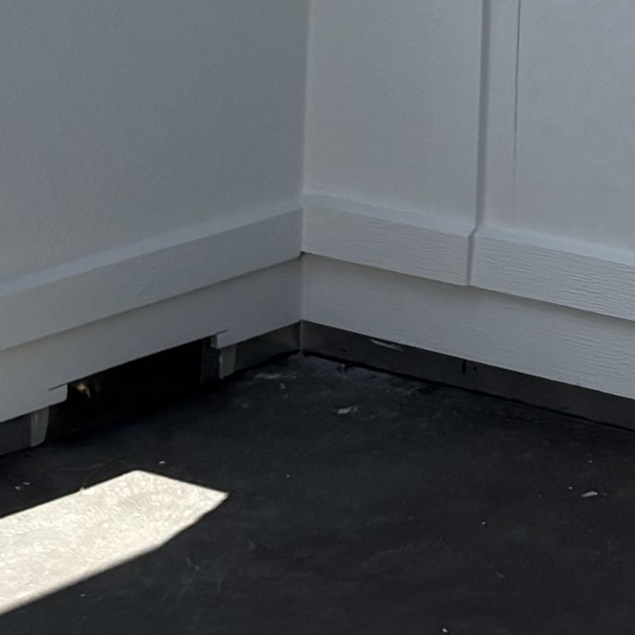 Damaged balcony waterproofing membrane exposed during demolition in Houston Heights 77007