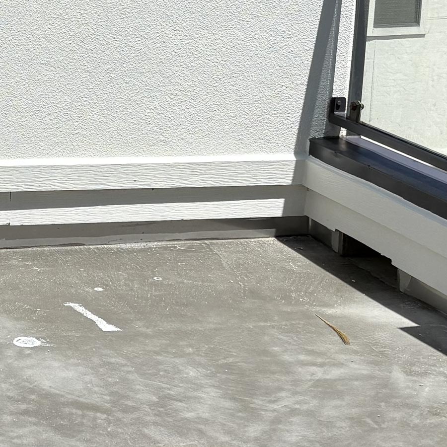 Failed Westcoat waterproofing system showing water damage before repair in Houston