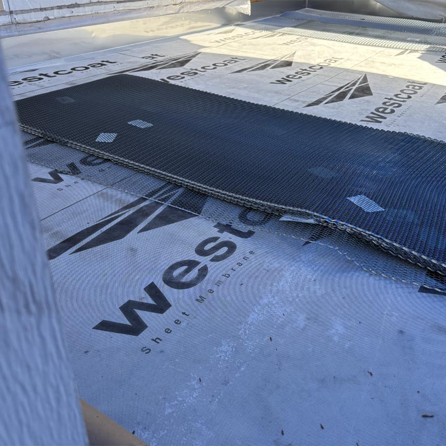 Westcoat membrane installation in progress on Houston Heights balcony repair