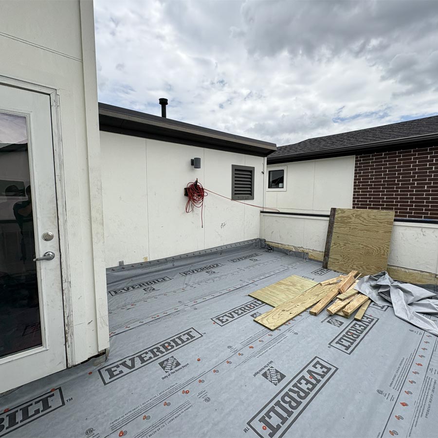 Damaged balcony decking requiring structural repair before waterproofing 77007