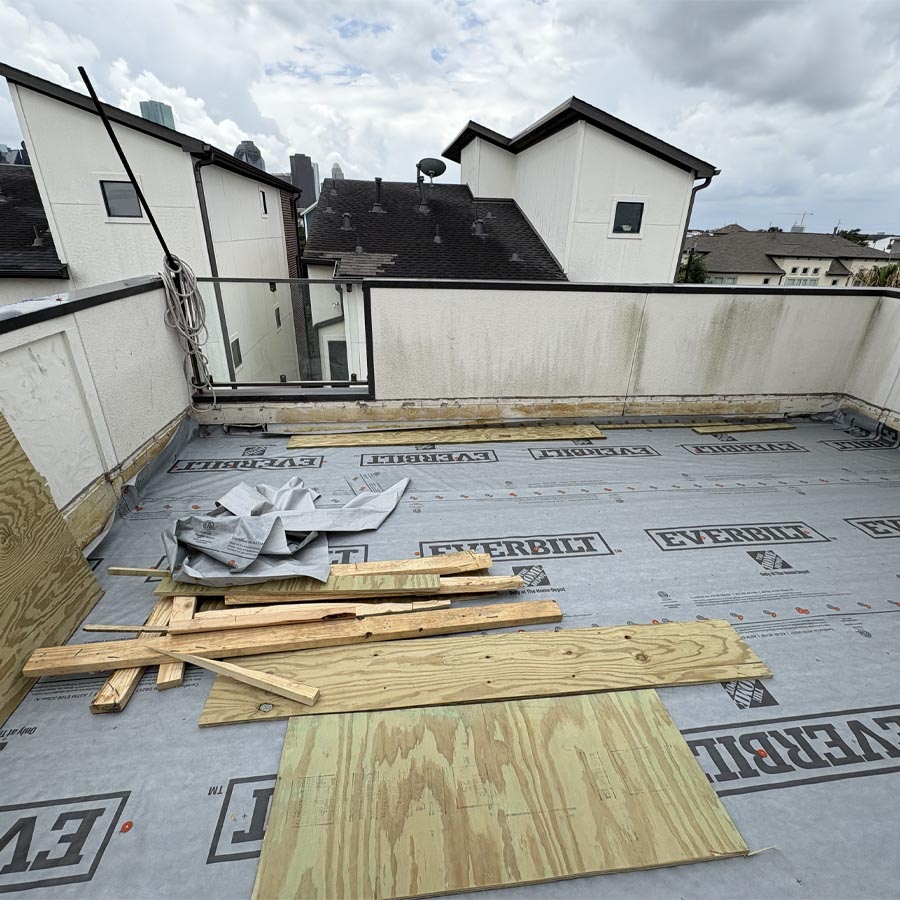 "Balcony drainage layer installation over waterproof membrane Houston Heights